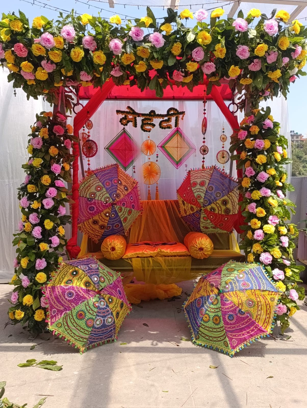 Colorful Mehndi Swing — Mehndi decoration by Floral Roots & Decor